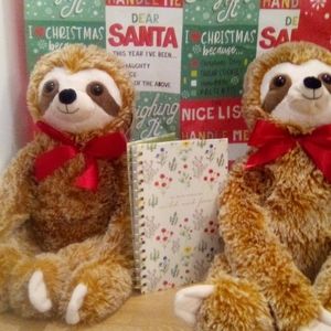 A Notebook and Two stuffed animals.